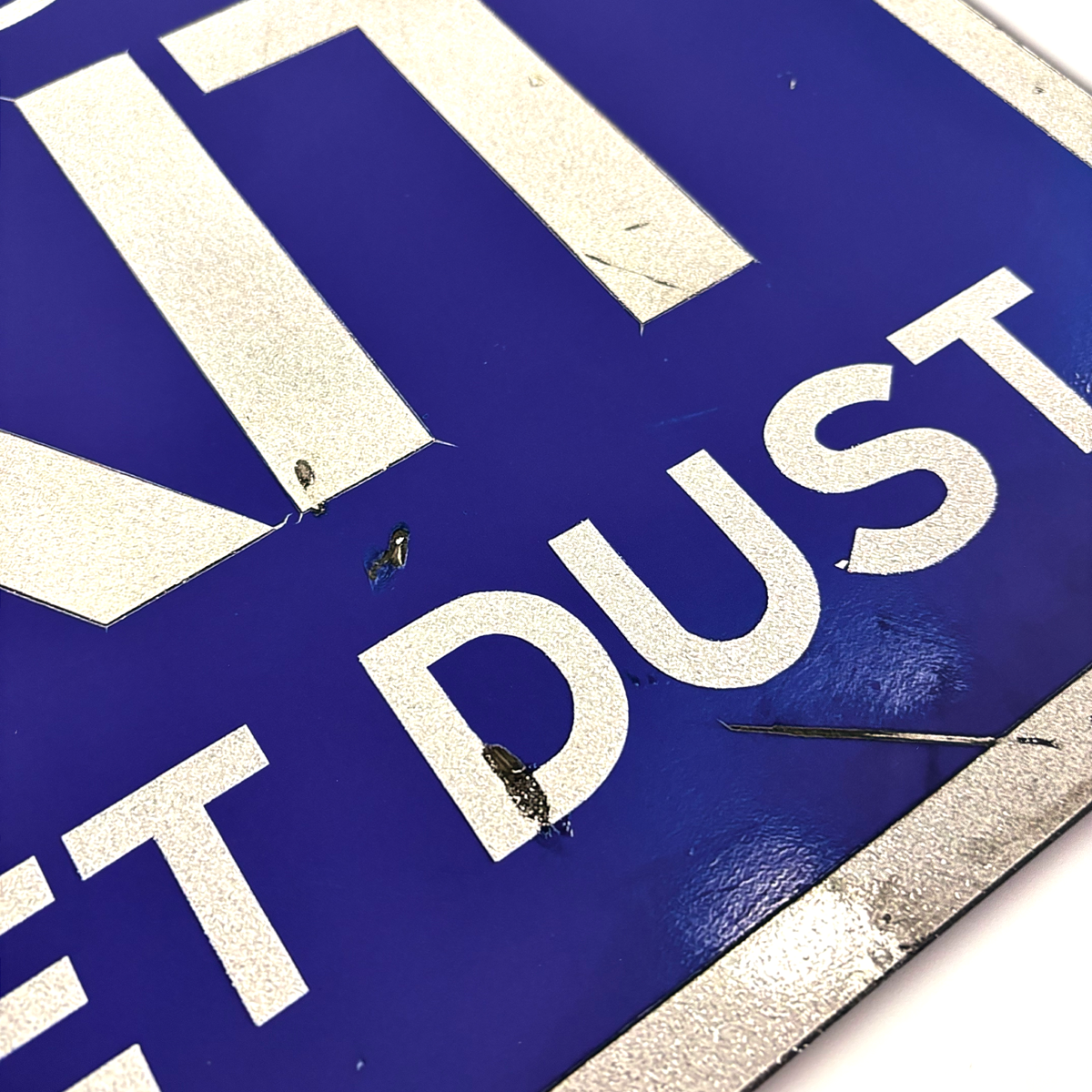 Close-up of the RocknRoad Sign Print – Exit Planet Dust by My Store, a blue and white giclée with scratches and dirt details. Limited edition of 25.