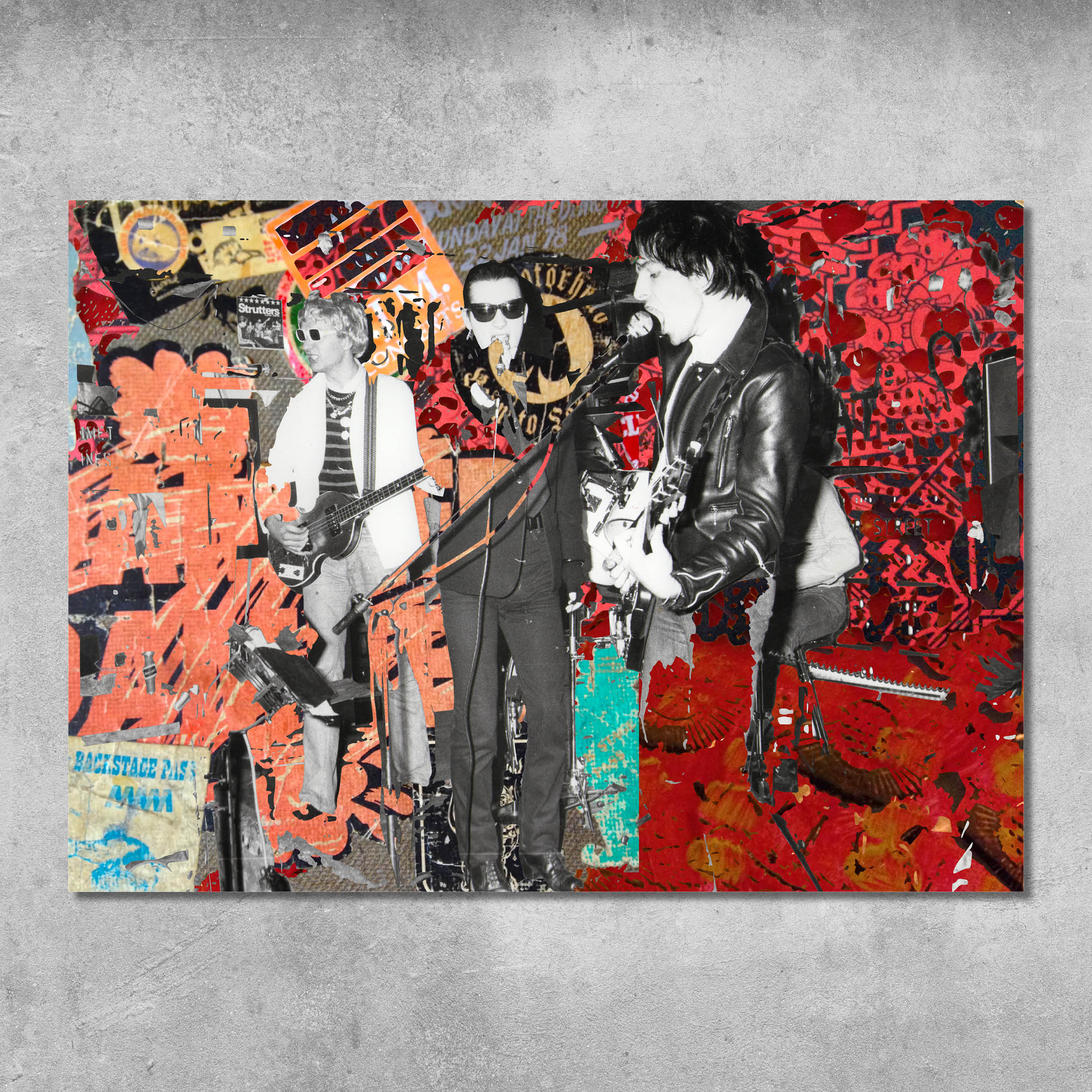 Memorabilia 9 (The Damned) Poster Print by 45 Original features a black and white photo of three musicians with guitars, set on a red-orange graffiti backdrop. Signed by Gaye Black. Available as a giclee print on archival paper.
