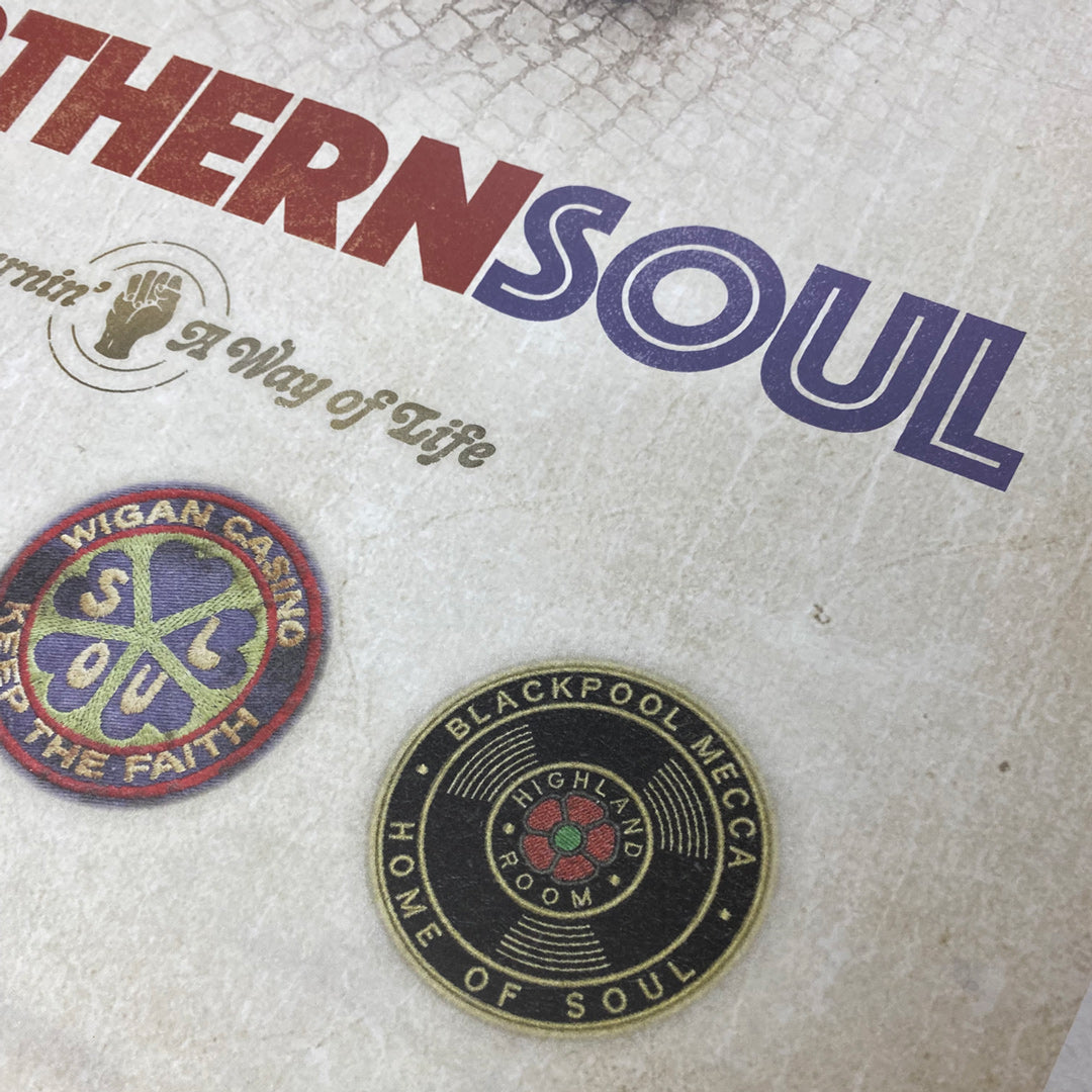 Close-up of the Northern Soul Poster Print - Limited Edition of Only 100 by My Store, featuring textured Northern Soul text in red and blue with two round badges: Wigan Casino Keep the Faith and Blackpool Mecca Home of Soul.