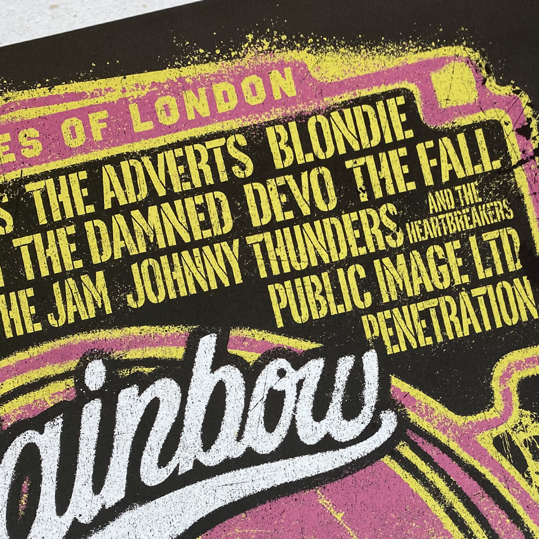 Close-up of the Rainbow Punk Poster Print by My Store—Limited Edition of Only 100—featuring bold yellow band names like Blondie, Devo, and The Damned on a distressed black and pink background inspired by The Rainbow Theatre.