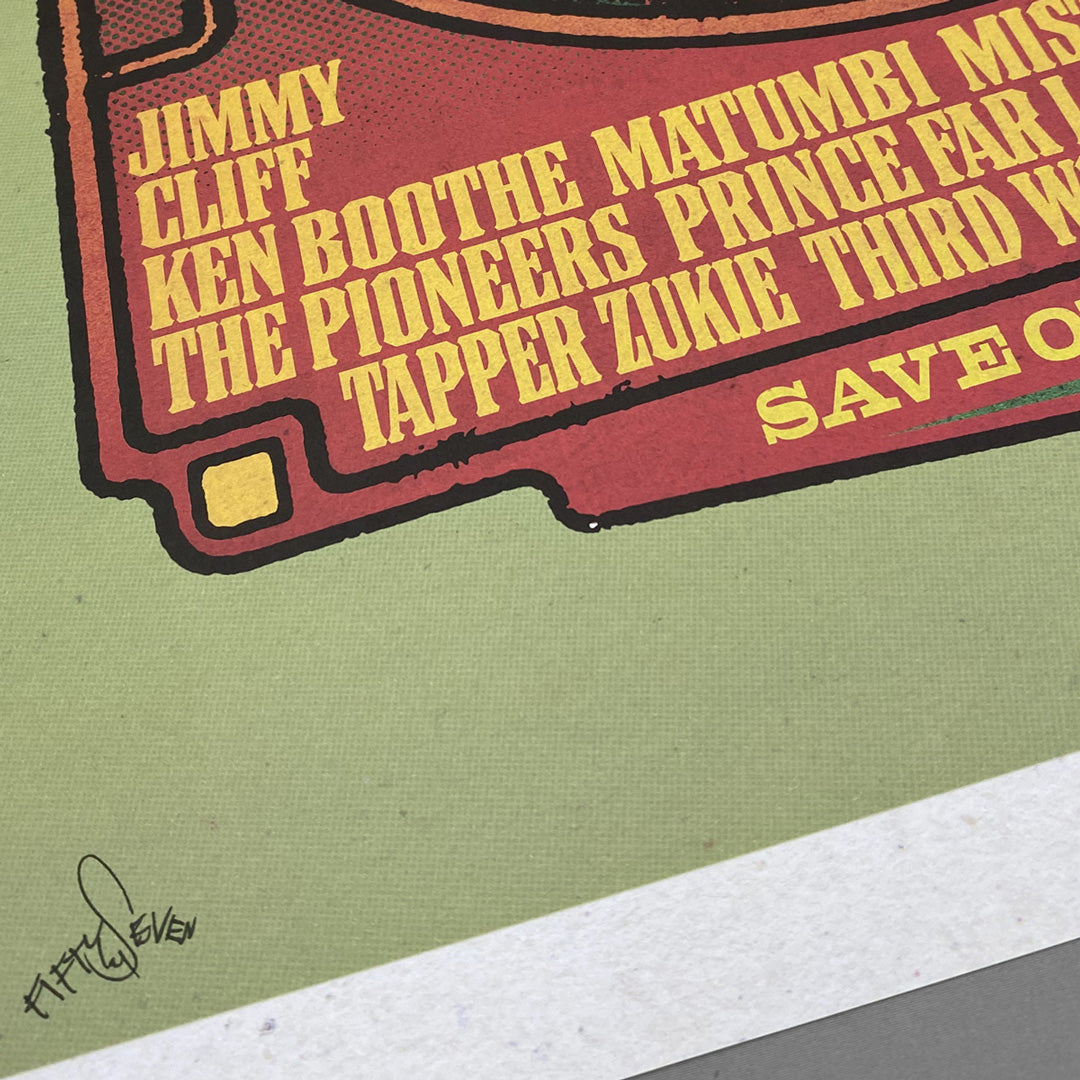 A close-up of the Rainbow Reggae Poster Print by My Store showcases bold yellow artist names on textured green, evoking a vintage concert at Rainbow Theatre—a limited edition art print with only 100 copies available.