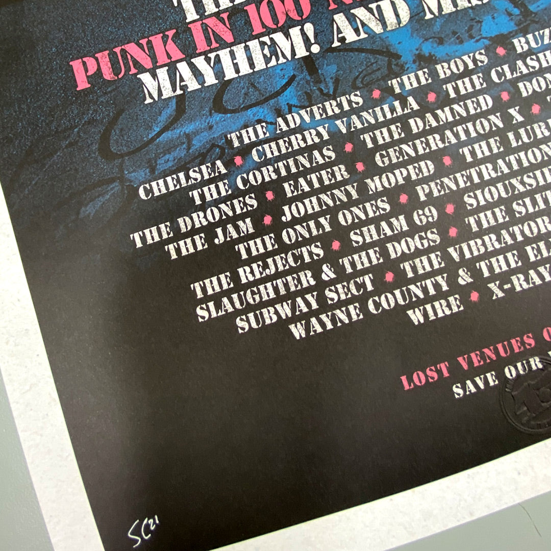 Close-up of the My Store Roxy Club Poster Print – Limited Edition of Only 100, featuring punk band names in white and blue on black. The poster edges show, with 5ca handwritten in white at the lower left corner.