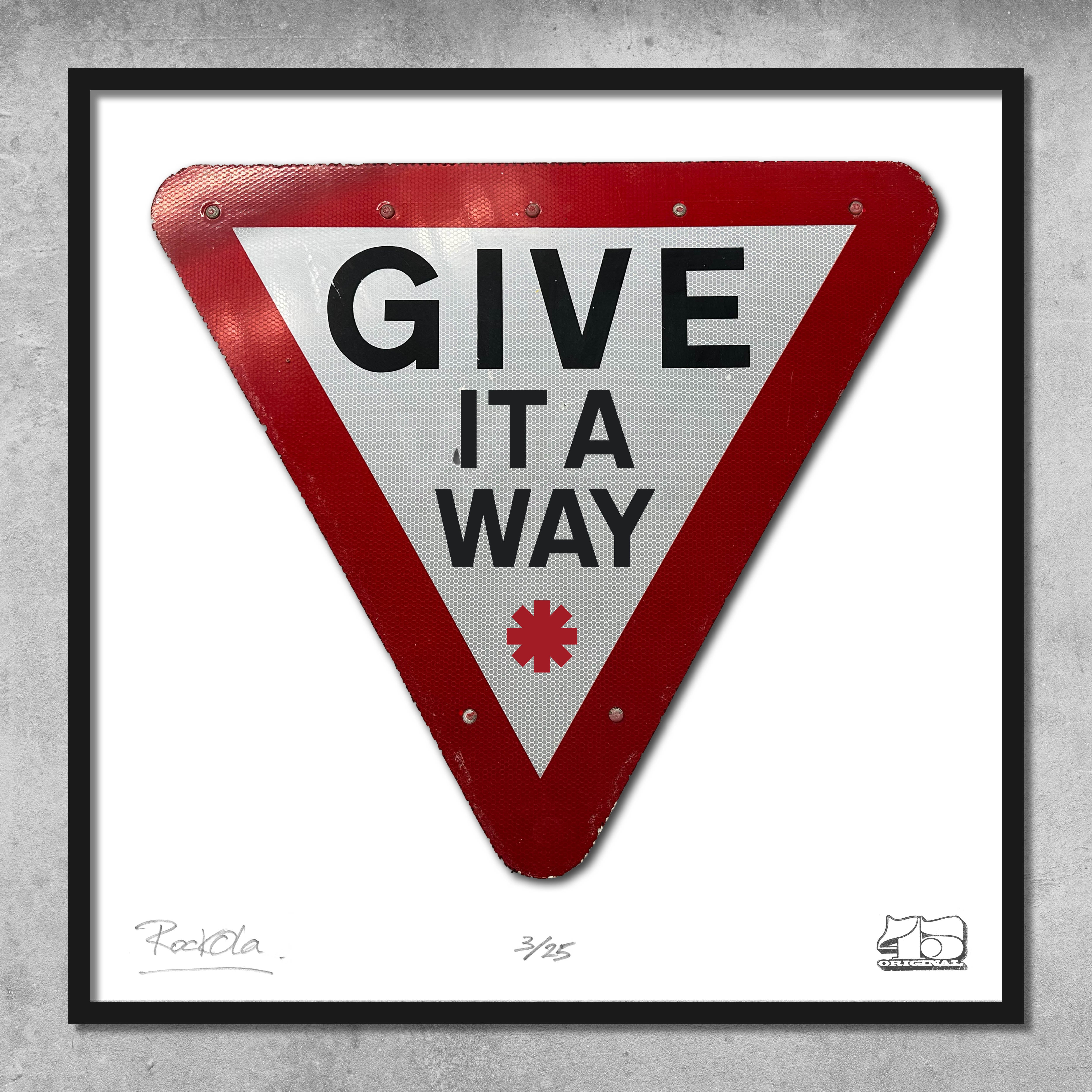The 45 Original RocknRoad Sign Print - Give It A Way is a limited edition framed giclée print (25 only) featuring a triangular UK road sign with GIVE IT A WAY and a red asterisk—ideal for collectors and print enthusiasts.