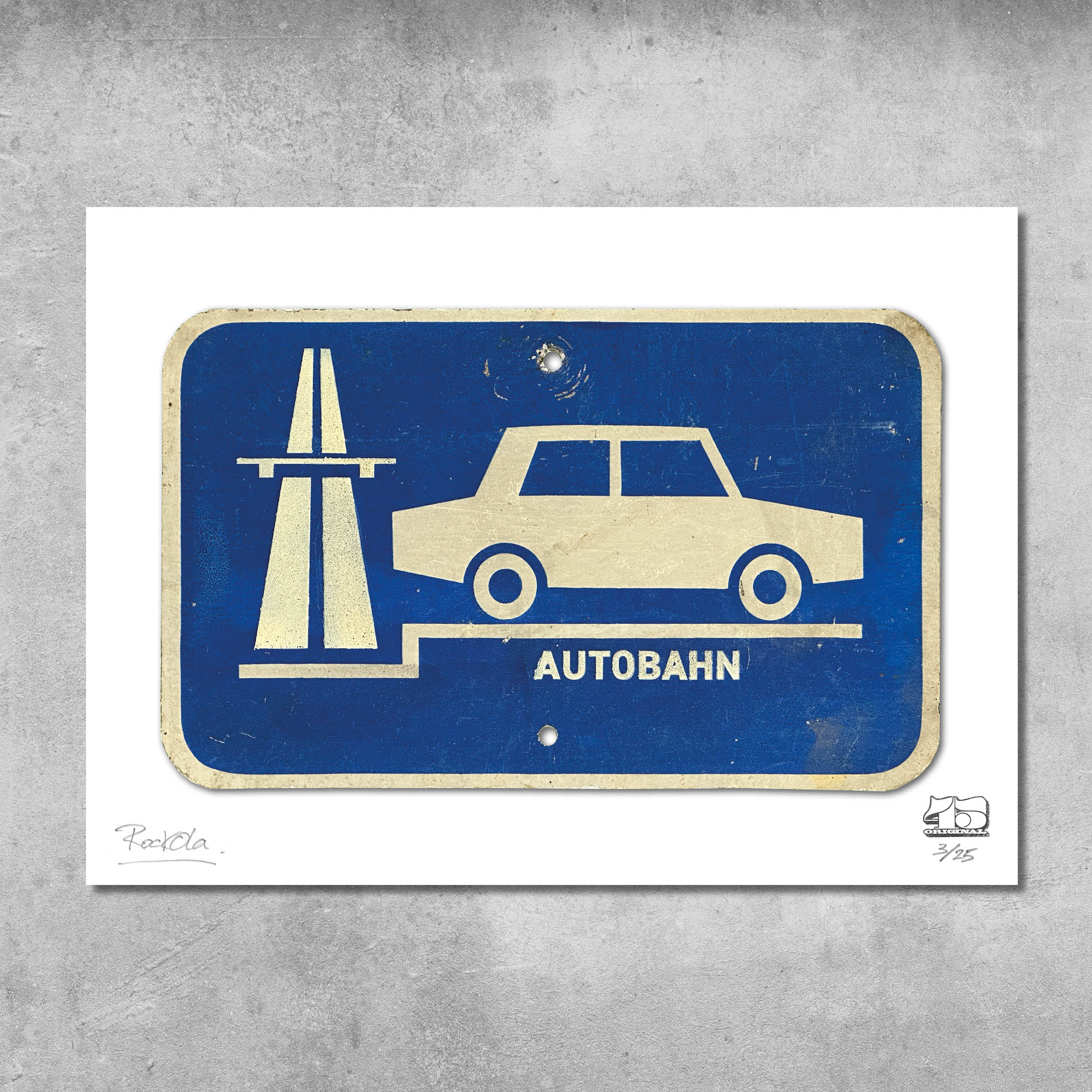 The RocknRoad Sign Print - Autobahn by My Store is a limited edition of 25, featuring a vintage blue and white East German road sign with a car, AUTOBAHN, and a stylized highway symbol on textured gray.