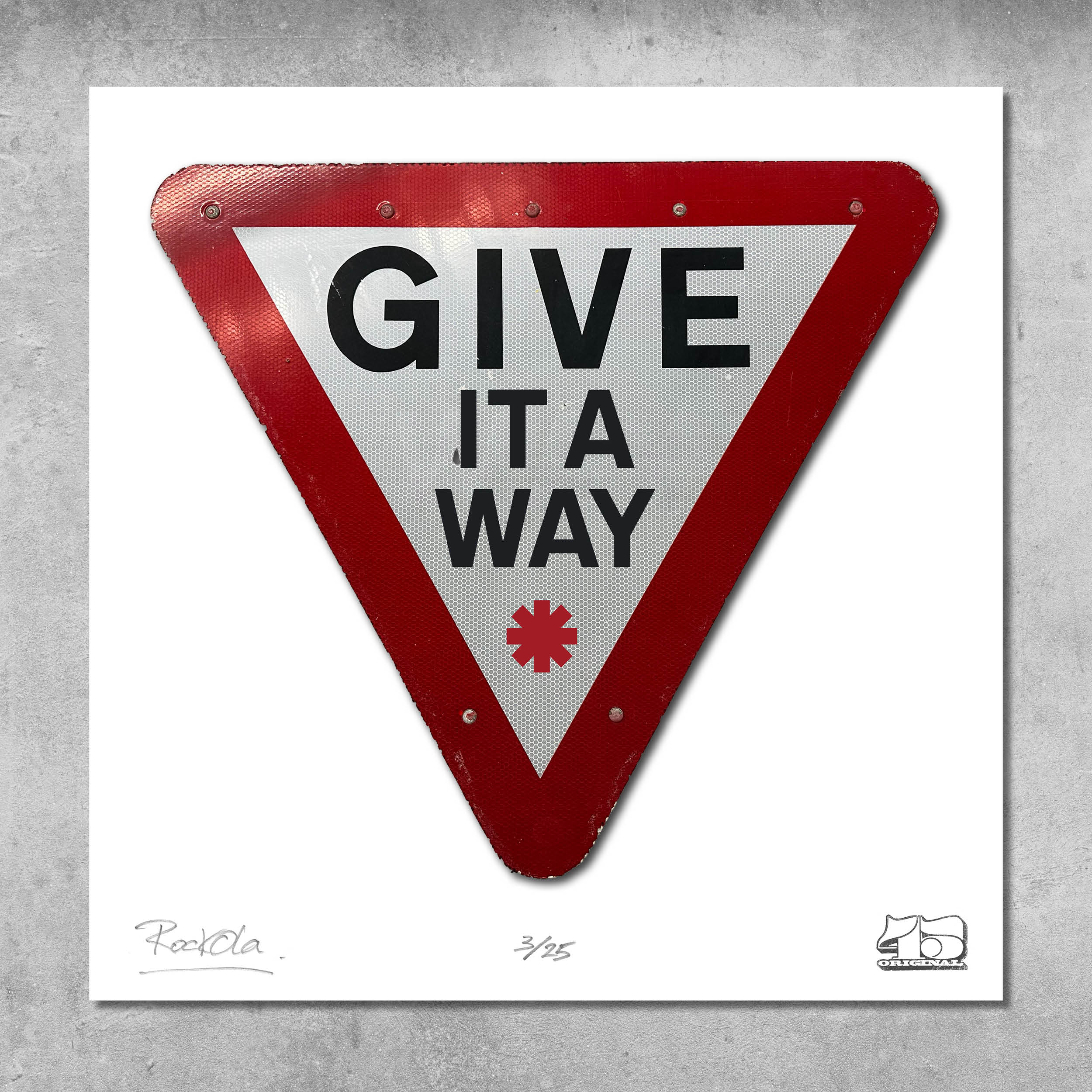 The RocknRoad Sign Print - Give It A Way by 45 Original is a limited edition of 25. This giclée print features a triangular UK road sign with red border and “GIVE IT A WAY” in bold, on a white background with a small red asterisk.
